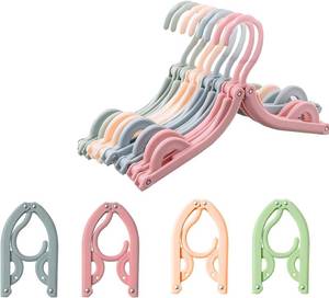 lot 5215 image: 8 Cruise Essentials Travel Hangers Portable Folding Clothes Hangers Travel Accessories Clothes Drying Rack for Travel (4 Color)