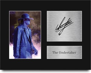 lot 2377 image: HWC Trading The Undertaker Gifts USL Printed Signed Autograph Picture for WWE & WWF Memorabilia Fans - US Letter Size
