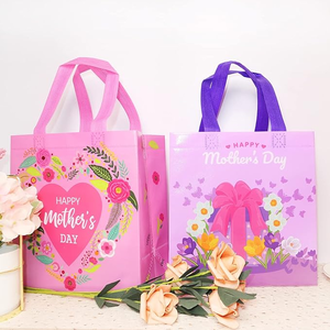 lot 3107 image: 12 Pcs Mothers Day Tote Gift Bags with Handles, 2 Designs (6 of Each), Waterproof and Reusable (see photos for product pictures)