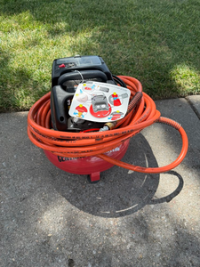 lot 11 image: Central Pneumatic 3 Gallon Oil-Free Air Compressor with Hose