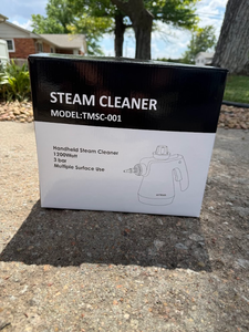 lot 50 image: Handheld Steam Cleaner Model TMSC-001
