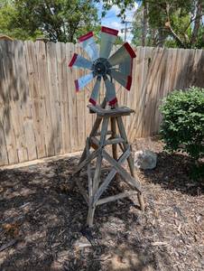 lot 106 image: Large Rustic Windmill Garden Decor on Wooden Tower  Approx. 6ft. Tall