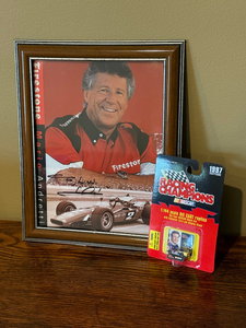 lot 153 image: Mario Andretti Signed Framed Print & 1997 Racing Champions NASCAR Die-Cast