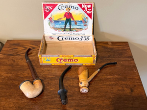 lot 157 image: Vintage Tobacco Collectibles Lot  Cremo Cigar Display Box, Meerschaum Pipe & Andrew Jackson Corn Cob Pipe
