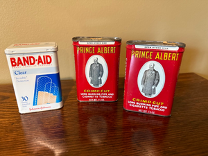 lot 167 image: Vintage Prince Albert Tobacco Tins & Band-Aid Tin Lot