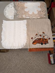 lot 221 image: Decorative Linens & Doily Lot  Lace Runner, Embroidered Cover & Fall Pumpkin Towel