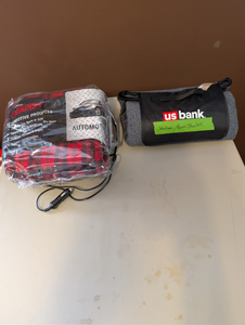lot 229 image: Automotive Heated Travel Blanket & USBank StadiumPicnic Blanket