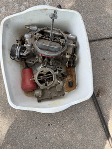lot 83 image: Vintage Automotive Carburetors & Engine Parts Lot  Edelbrock, Rochester & Misc. Components