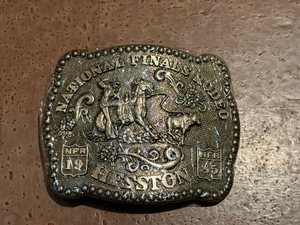 lot 358 image: 1985 Hesston National Finals Rodeo Belt Buckle  NFR Collector Buckle