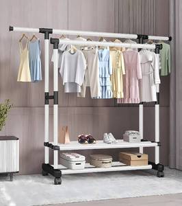 lot 2795 image: Simple Trending Standard Clothing Garment Rack, Rolling Clothes Organizer with Wheels and Bottom Shelves, Extendable
